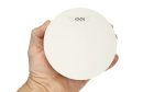 ZEN Photoelectric Smoke Alarm held in the hand showing slimline profile